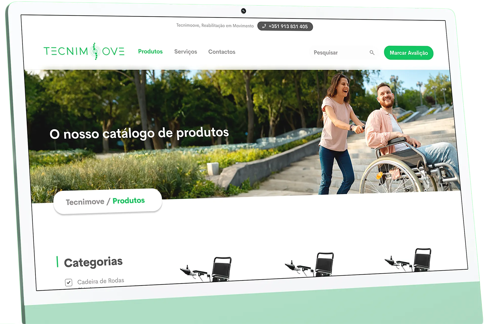 Laptop displaying the Tecnimoove homepage, with the 'Reabilitação em Movimento' hero Laptop displaying the Tecnimoove homepage, with the 'Reabilitação em Movimento' hero and a photo of a manual wheelchair